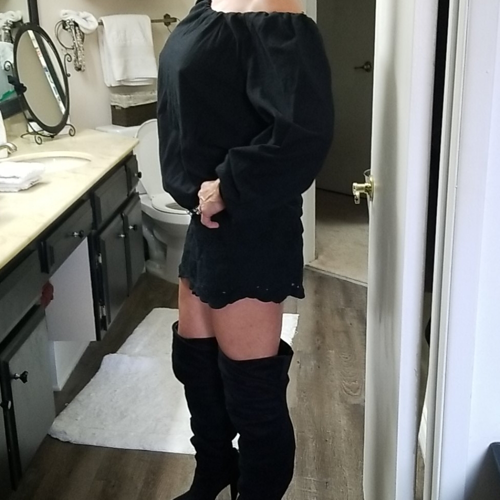 Black off shoulder dress.